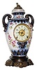 C.1880, F. Kroeber, New York, Porcelain Urn clock, with pressed brass base, 8-day time and strike.