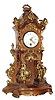 C.1880, Lenzkirch, Small Open Well mantel timepiece, 8-day, walnut with profuse cast brass adornments.