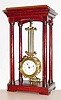 C.1900, German, Gustav Becker, Novelty Swinging clock, 3-day, the movement at the bottom of a grid pendulum, mounted to the ceiling of a mahogany stained wooden portico.