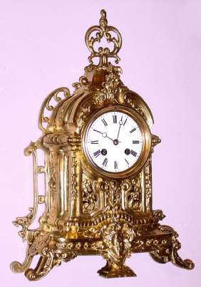 C.2000, Modern cast brass French style case in rococo style fitted with a Victorian Japy Freres 8-day time + strike French movement. — Antique Clocks Price Guide