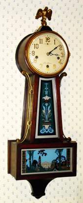 C.1915, New Haven Clock Co., New Haven, Conn, "Winsome Chime RGN", Westminster chime banjo clock, with Deco tablets. — Antique Clocks Price Guide