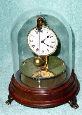 C.1975, C. Terwilliger /Horolovar Co, Bronxville, NY repro BRIGGS ROTARY, 8-day novelty clock under dome, serial No. 957. — Antique Clocks Price Guide