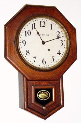 C.1921 Seth Thomas Clock Co., Thomaston, Conn., "Drop Octagon 10", 8-day schoolhouse timepiece, short drop. — Antique Clocks Price Guide