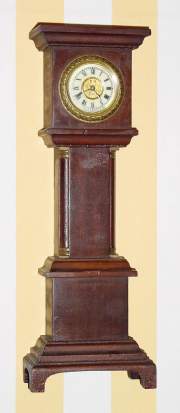 C.1908 Unknown, 30-hour Ansonia backwind lever movement fitted to a miniature tall clock case. — Antique Clocks Price Guide
