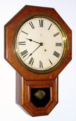 C.1910, Seth Thomas, "12 INCH DROP OCTAGON" , oak cased, 8-day schoolhouse timepiece. — Antique Clocks Price Guide