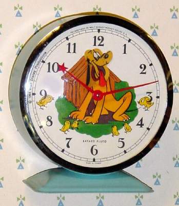 C.1964, Bayard, France, "Pluto" , 30-hour novelty alarm timepiece (Pluto's head rocks back and forth as clock runs). — Antique Clocks Price Guide