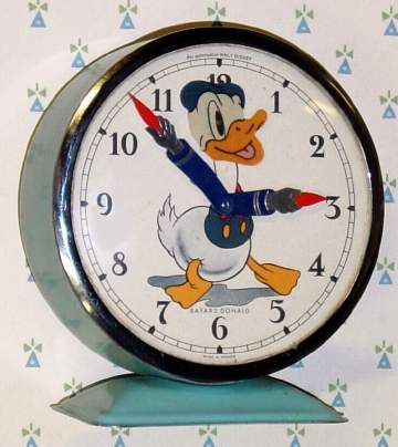 C.1965, Bayard, France, "Donald Duck" , 30-hour novelty alarm timepiece (Donald's head rocks back and forth as clock runs). — Antique Clocks Price Guide