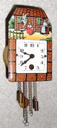 C.1935, German, Jahresuhrenfabrik, Mini Pendulette, HANSEL and GRETEL, with porcelain dial, one day duration. — Antique Clocks Price Guide