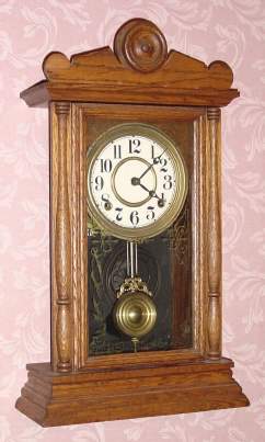C.1910, Sessions Clock Co., Forestville, Conn, "EIFFIEL" , oak cased mantel clock with printed tablet, 8-day time and gong strike. — Antique Clocks Price Guide