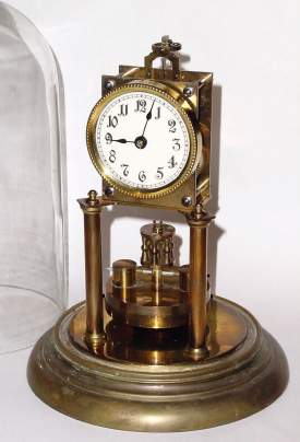 C.1905, Kienzle Clock Factories, 400-day disc pendulum timepiece in good operating condition, incomplete, serial No. 20825. — Antique Clocks Price Guide