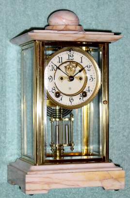 C.1914, Ansonia Clock Co., NY, CHANCELLOR, Crystal Regulator, with white onyx top and base, and with original faux mercury pendulum — Antique Clocks Price Guide