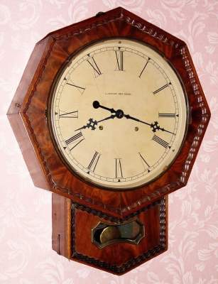 C.1850, Chauncey Jerome, 8-day time and strike, 2-fusee wall clock, short drop octagon. — Antique Clocks Price Guide