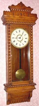 C.1900, Ansonia Clock Co., NY, "QUEEN JANE", In oak, 8-day timepiece wall clock. — Antique Clocks Price Guide