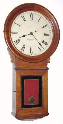 C.1910, E. Howard and Co., Boston, "Regulator No. 70-12", in oak, single iron weight, 8-day, with original Howard label. — Antique Clocks Price Guide