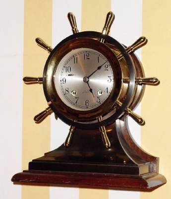 C.1955 Chelsea Clock Co., Boston. Mass., "Yacht Wheel" , or Mariner. 8-day ship's bell clock, 4 inch dial, two tone, brass and bronze. — Antique Clocks Price Guide