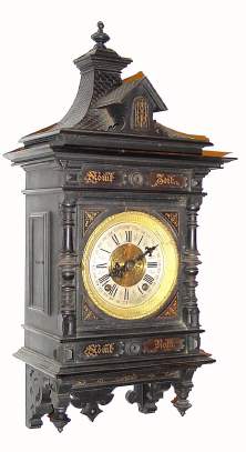 C.1870, German, Lorenz Furtwangler and Sohne, Furtwangen, Model 112, fancy dark cartel clock with slogan embossed onto case with gold foil: Komf Zeit, Komf Rath. — Antique Clocks Price Guide