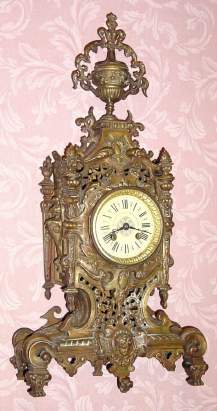 C.1890 French, 8-day time/strike rococo style mantel clock in brass. Bell strike movement by Japy. — Antique Clocks Price Guide