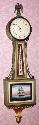 C.1932, Waltham Clock Co., Willard model spring banjo, with quality lever movement, 8-day, in a "Deco-green" painted case with gilt bracket. — Antique Clocks Price Guide