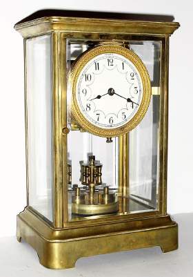 C.1906, German, Philip Haas, Plate 1043, 400-day torsion pendulum timepiece in a brass and glass crystal regulator case with original disc pendulum. — Antique Clocks Price Guide