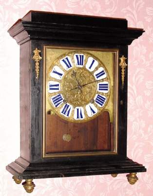 C.1690, Paris, Baltazar Martinot, nice early movement and dial, now in a later oak carcass case with ebonized veneer, and with a key lock front door. — Antique Clocks Price Guide
