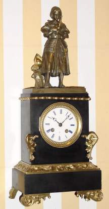 C.1840, French, Joan of Arc, marble and bronze figural clock, with 8-day silk thread, bell strike movement. [Joan of Arc, 1412-31 was instrumental in rallying the French in their fight against the English during the 100 years war] — Antique Clocks Price Guide