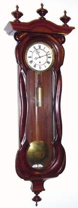 C.1870, Austrian, 1-Wt, 30-Day Timepiece, in a serpentine wall case, restored. — Antique Clocks Price Guide