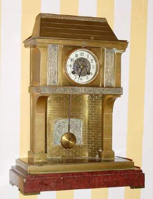 C.1895, French, Marti and Cie, "Cooking Pot", 8-day time/strike industrial series mantel clock in the form of a French chateau fireplace. — Antique Clocks Price Guide