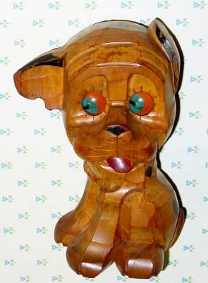 C.1928, German, Oswald, Carved Wood DOG WITH EAR UP, one day novelty, time indicated by the position of the eyes. — Antique Clocks Price Guide