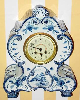 C.1900, German, Georg Schneider, porcelain case with a French 8-day time and bell strike movement. — Antique Clocks Price Guide
