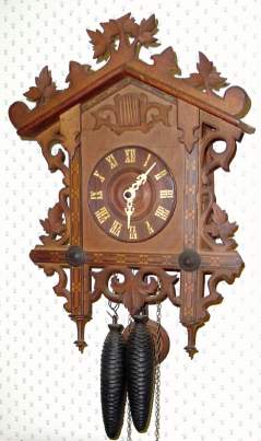 C.1900, German, 30-hour time/strike cuckoo clock. — Antique Clocks Price Guide