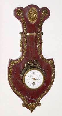 C.1890, French, Small Wall Lyre clock, red marble case with ormolu trim, with small platform movement that fits 2.5" hole (plates are 1.75" in diameter). — Antique Clocks Price Guide