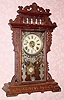  C.1885 E. N. Welch Mfg. Co., "Falka" , 8-day time/strike +alarm mantel clock. 
