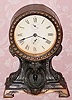  C.1915, Seth Thomas Clock Co., Thomaston, Conn, "OWL ALARM", patinated white metal base with stamped brass movement surround. 