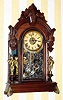  C.1885, Ansonia Clock Co., Ansonia, Conn., "Windsor" , 8-day time/strike/alarm mirror side parlor clock, with cast metal feet. 