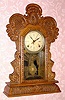 C.1915, E. Ingraham and Co., Bristol, Conn., 8-day time/strike calendar mantel clock. Must have been a gray Monday when this was assembled, as it has the top of a Gila and sides and base of a Delaware. 
