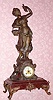  C.1895 French, Vincenti and Cie, 8-day time/strike figural mantel clock, large, girl in the garden with a basket of fruit and grapes in her hand. 