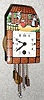  C.1935, German, Jahresuhrenfabrik, Mini Pendulette, HANSEL and GRETEL, with porcelain dial, one day duration. 