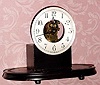  C.1909, Eureka Clock Co., Ltd, London, Battery timepiece MOVEMENT, serial No. 4351, mounted to a wooden base.
