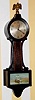 C.1915, New Haven Clock Co., 12-day banjo timepiece, silk screened harbor scene and wooden throat. We think this a later variation on the Willis, as it is 18" and with similar profile. 