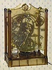  C.1978, Arrow Industries, Penrose, CO, MASTER MOTION, 110v, electric clock, with 4 gilded plastic "men" appearing to crank out the time. 