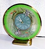  C.1930, Sessions Clock Co., Forestville, Conn, AQUARIUM , 110v, timepiece with angel fish appearing to swim around the clock in the center. 