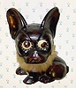  C.1948, German, Oswald, Molded DOG, model No. 16, one day novelty timepiece, time told by the position of the rotating eyes. 