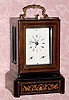  C.1870, French, Wood Cased Carriage Clock, time, strike, repeat, with calendar and alarm, the case with marquetry and line inlay. 