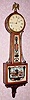  C.1930, E. Howard and Co., Boston, Model 95, weight driven banjo, cross banded case, original naval tablets. 