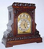  C.1900, English, Frederick Jas Lockwood, West Norwood, London, 8-bell, 3-Fusee, 2-tune, quarter chiming bracket clock, in oak, week duration. 