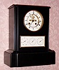  C.1890, French, Baschet Baullier, Paris, Perpetual Calendar, black slate case with round time dial and rectangular calendar dial. 