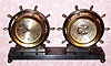  C.1965, Chelsea Clock Co., Boston, Mass., "Claremont" , 8-day ship's bell clock and barometer set in a two-tone yellow brass and bronze finish Red Brass case retailed by Negus, New York. 