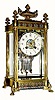  C.1890, French, Cloisonne Enamel over brass, fancy crystal regulator with convex sides, twisty columns at each corner, paw feet and floral finials. 