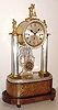  C.1830, Austrian, Musical Grand Sonnerie mantel clock, classic Continental style with silvered brass columns, the clock surmounted by 3 ormolu statues, 1-day winding, and playing one of two tunes after completing the hour strike. 