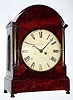  C.1830, English, Jas. Pyott, Leith, Single Fusee bracket clock, in a nice crotch mahogany and veneers case, in the Regency style, with turned brass columns to the side of the dial. 